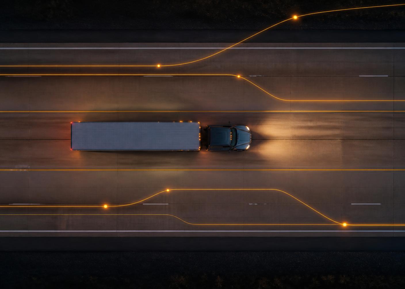 Fleet of trucks on highway with GPS tracking overlay